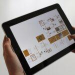 Person Holding Black Ipad