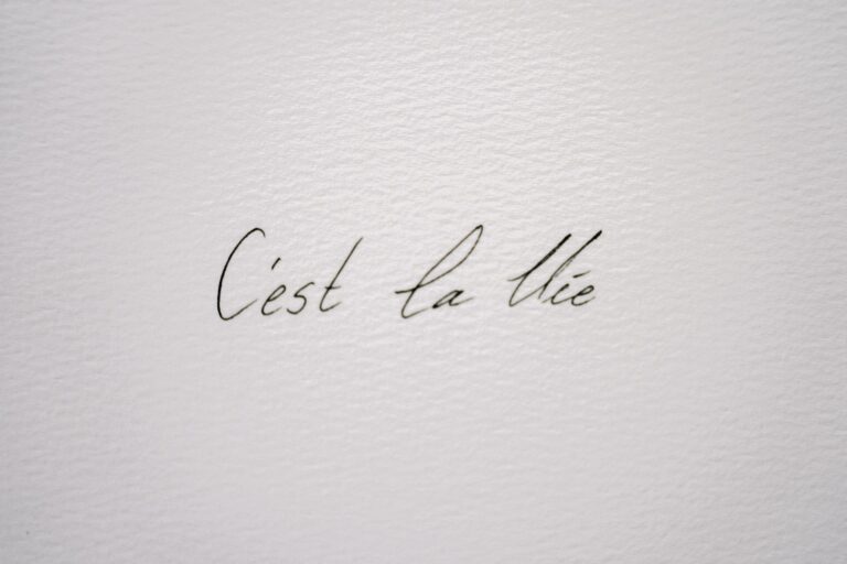 Close-Up Shot of a Quote on a Paper