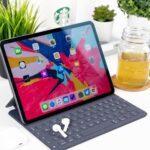 turned-on black tablet computer with keyboard