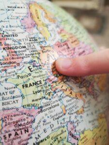 person holding white and blue map