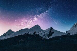 snow mountain under stars